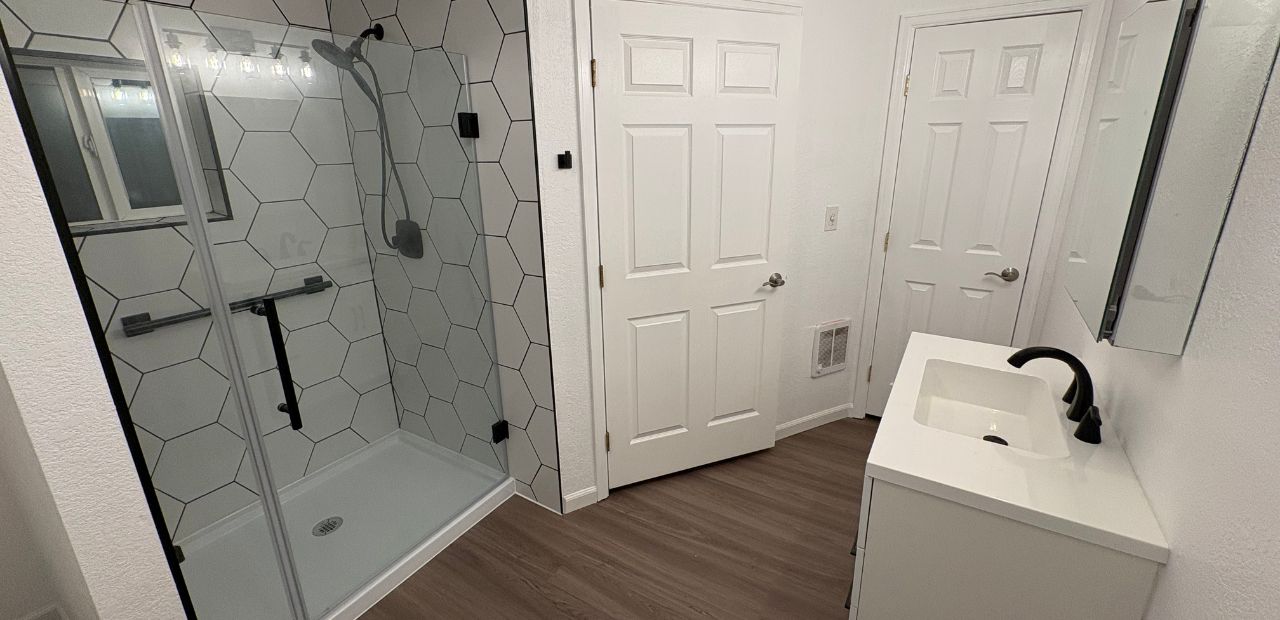 New modern walk-in shower with comfortable shower seat 