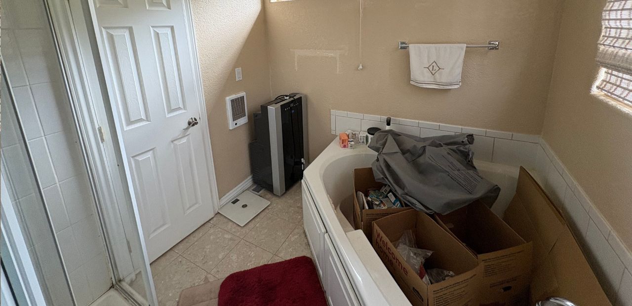 Weird bathroom layout with a bathtub that never got used